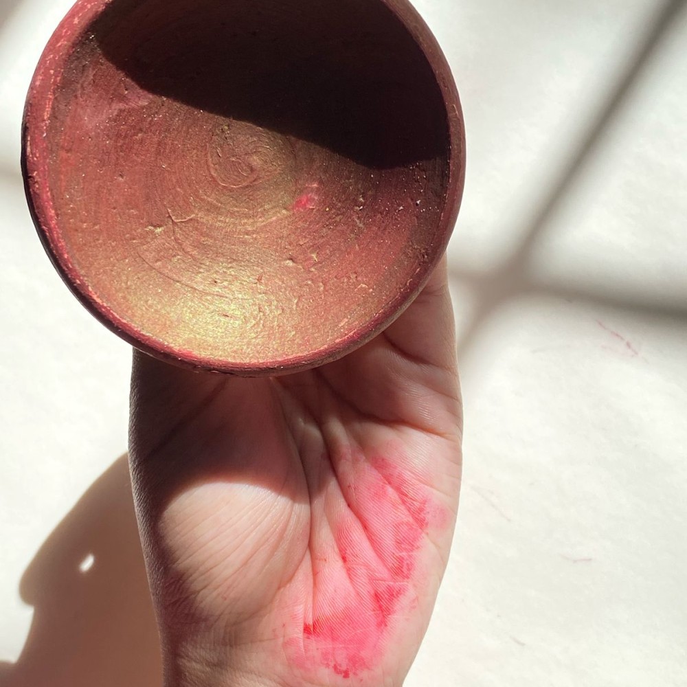 Traditional Moroccan Aker Fassi lipstick in clay pot – natural herbal cosmetic product